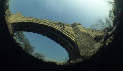 Devils Bridge, from beneath surface of River Lune, Cumbri... by Mark Thomas 